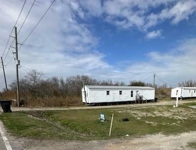 Property Photo:  34557 Hwy 11  LA 70041 