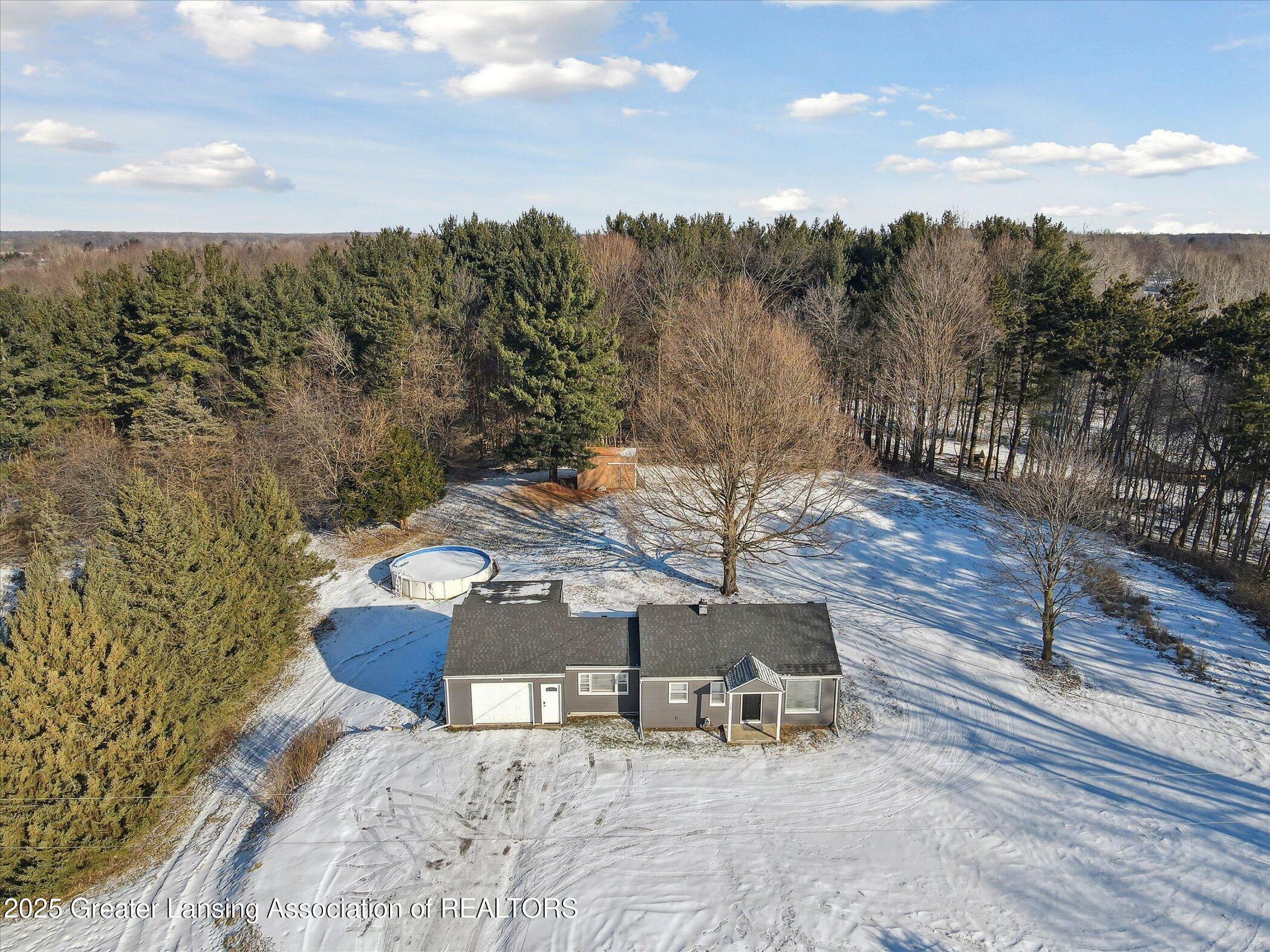 Property Photo:  5353 E Clark Road  MI 48808 