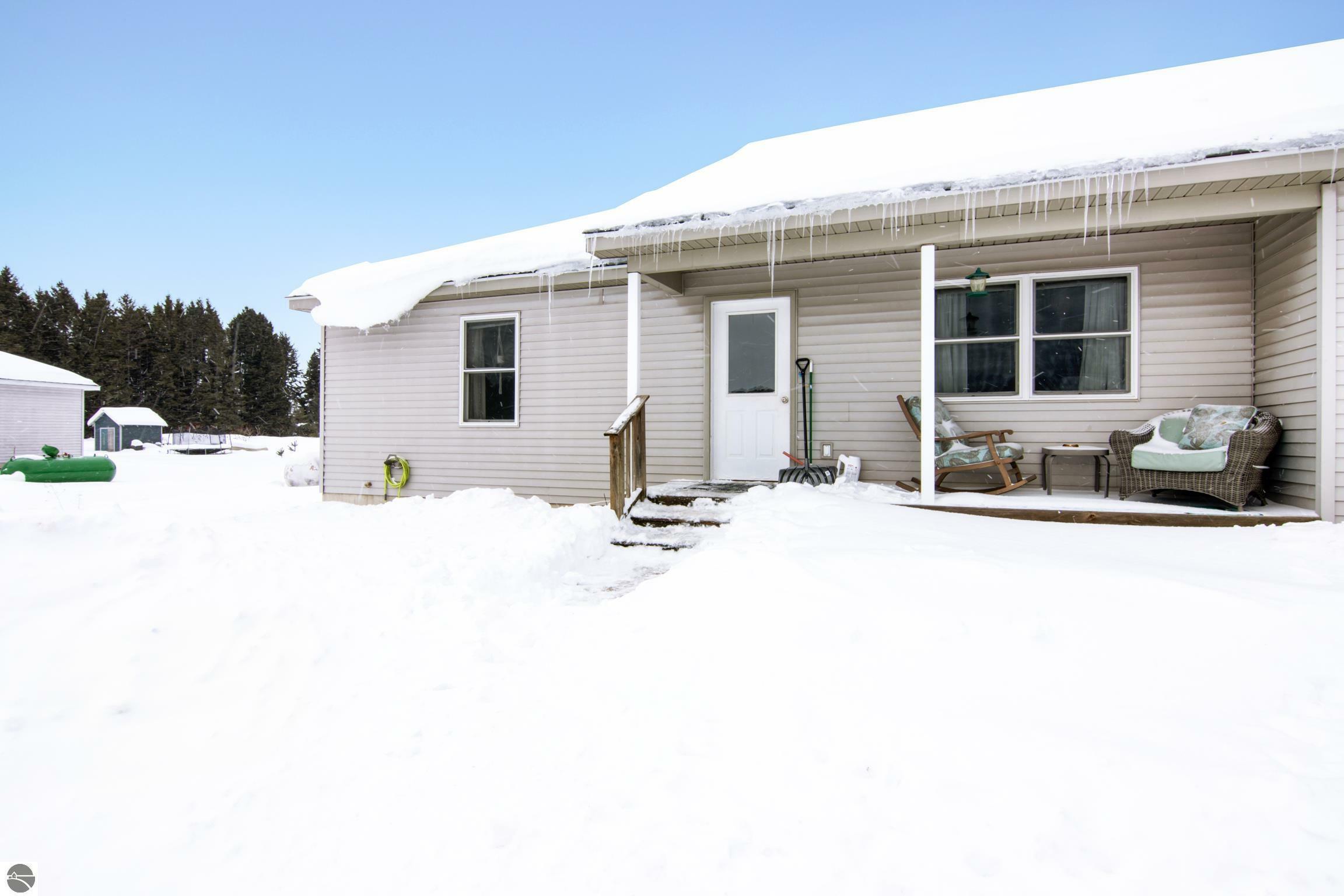 Property Photo:  7310 Tiger Drive  MI 49650 