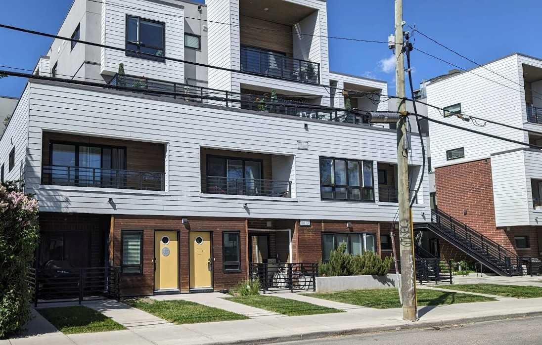 Property Photo: 128 18 Avenue SW - AB T2S 0B9