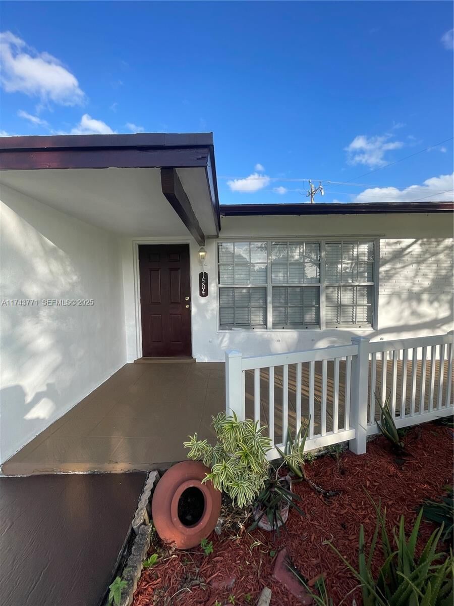 Property Photo:  1504 NW 58th Ave  FL 33063 