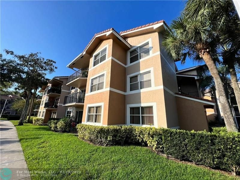 Property Photo:  9055 Wiles Rd 108  FL 33067 