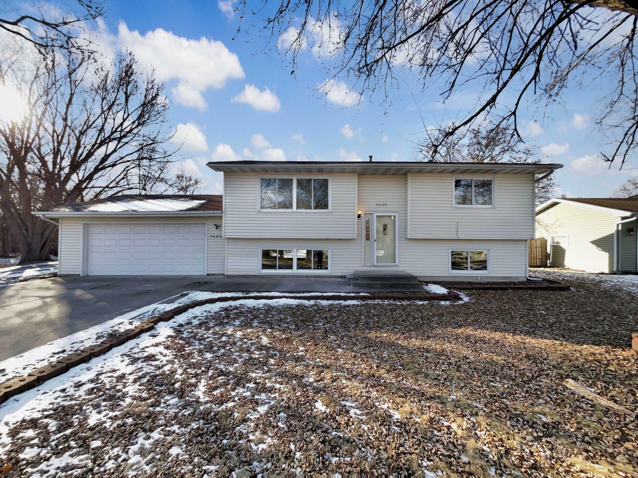 Property Photo:  7689 Newton Avenue N  MN 55444 