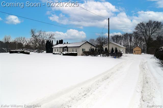 Property Photo:  635 Joslyn Road  MI 48362 