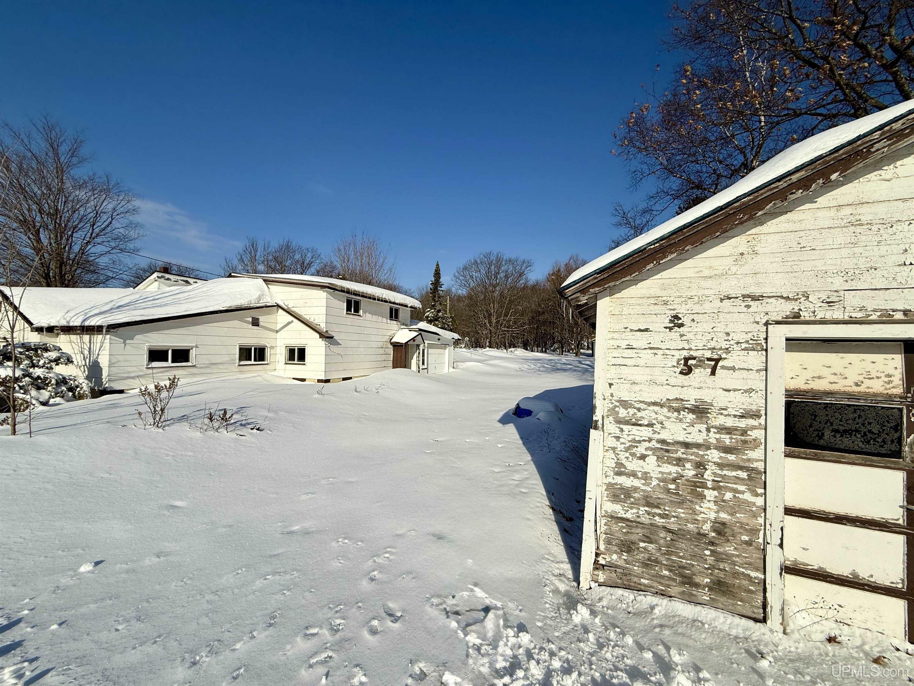 Property Photo:  57 1/2 Midway Drive  MI 49866 