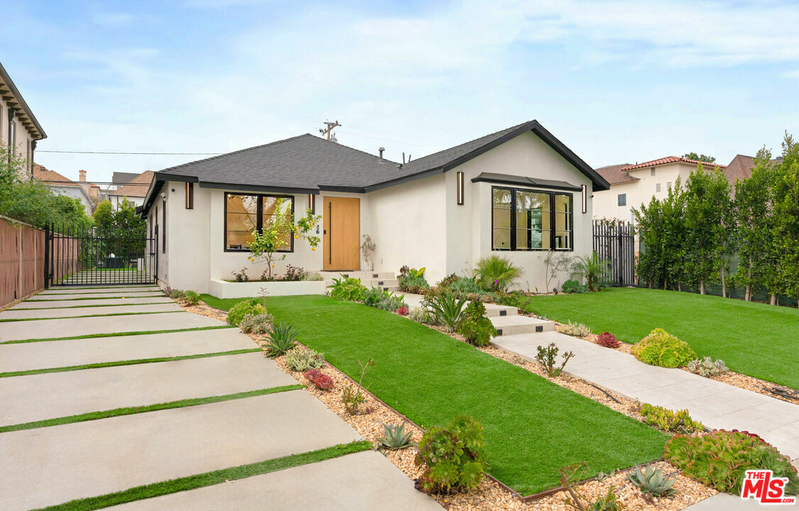 Property Photo: 309 S Canon Dr CA 90212