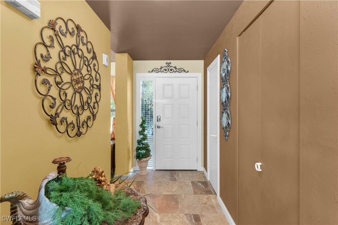 Property Photo: 103 La Peninsula Boulevard 103 FL 34113