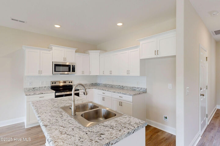 Property Photo: 207 Sandpiper Place NC 28445