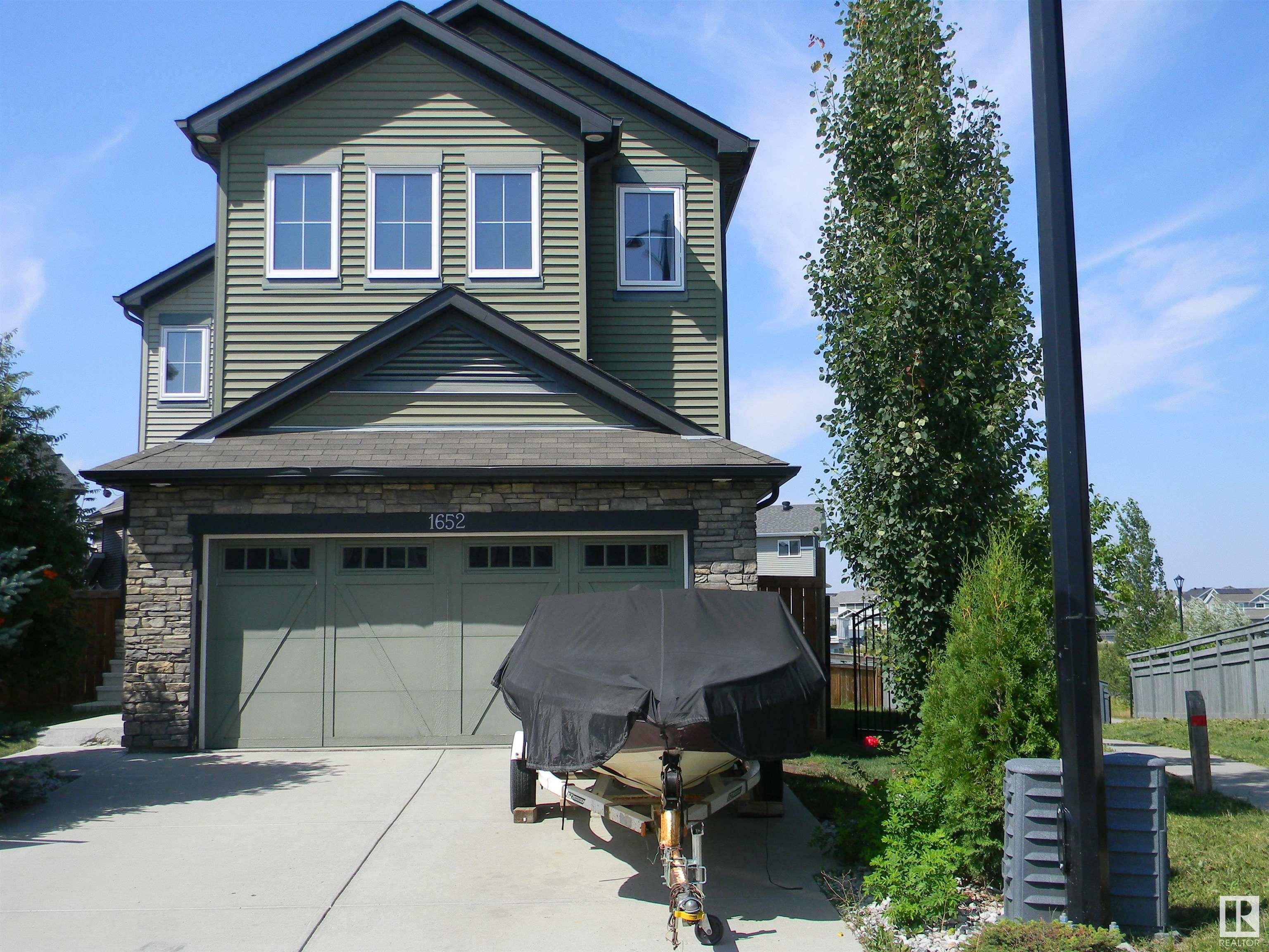 Property Photo:  1652 Davidson Green SW  AB T6W 3J3 