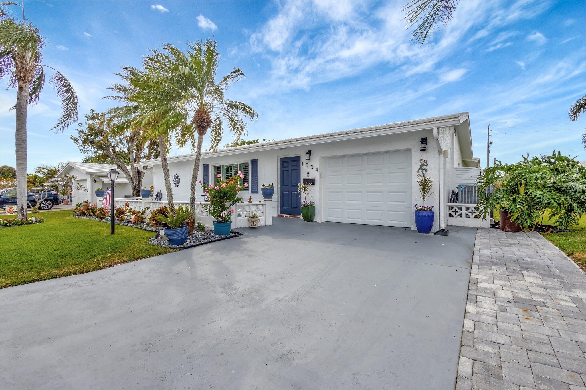 Property Photo:  1504 SW 22nd Avenue  FL 33426 