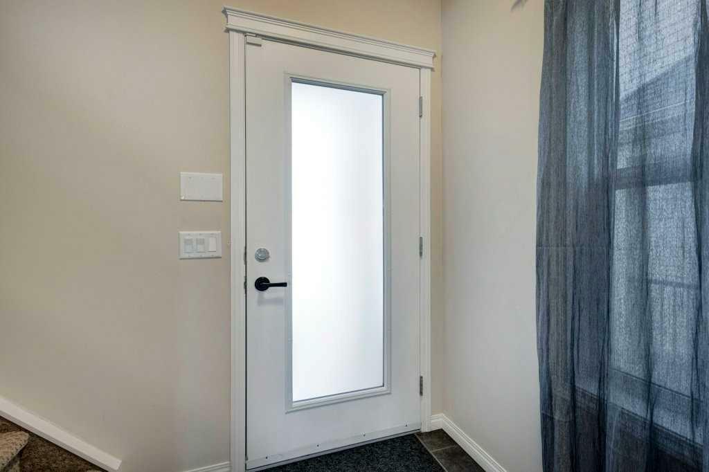 Property Photo:  129 Walden Crescent SE  AB T2X 0T2 