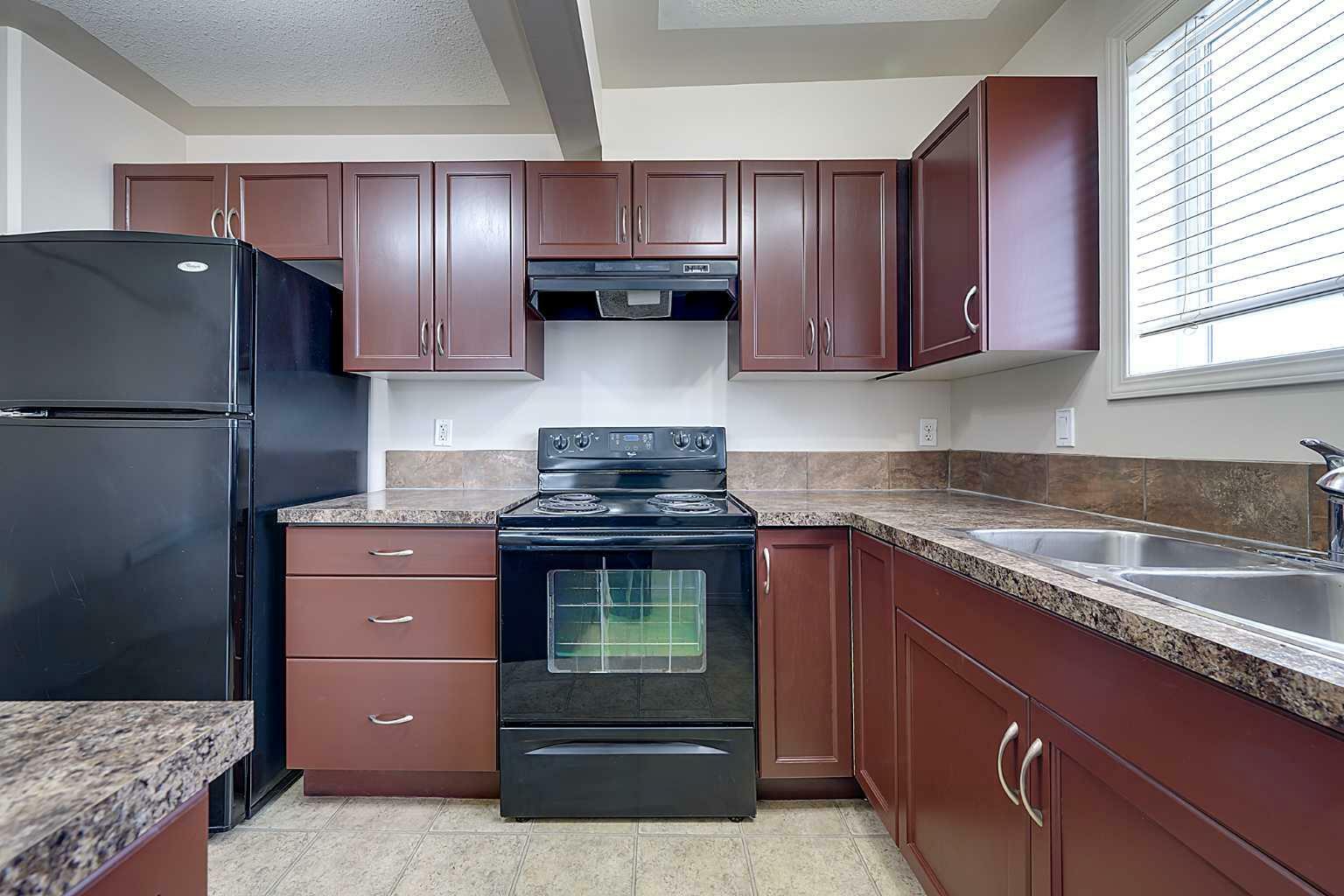 Property Photo: 5601 Kerrywood Drive 307 AB T4N 4X3