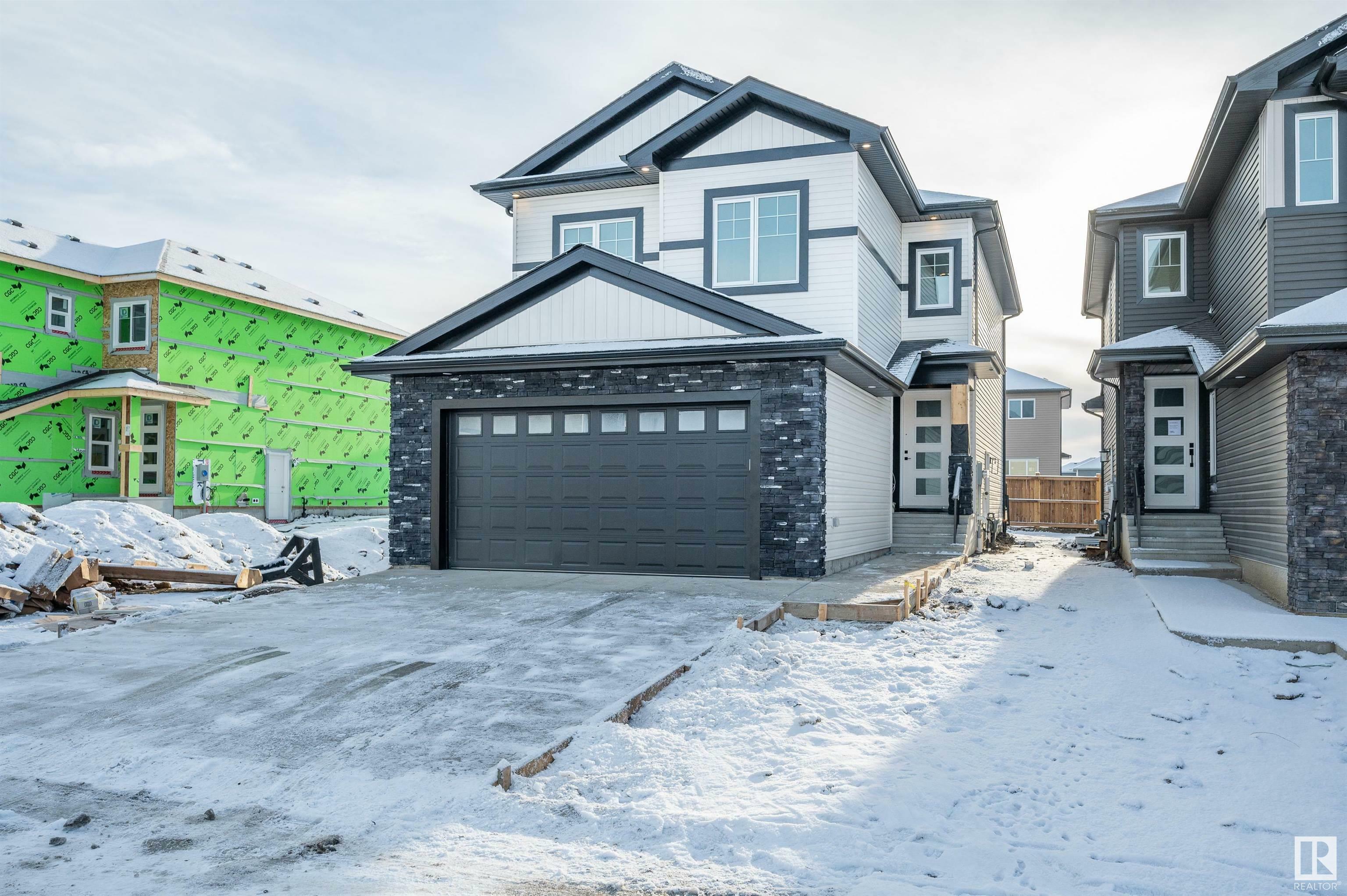 Property Photo: 9 Blackbird Bend AB T8L 2E0