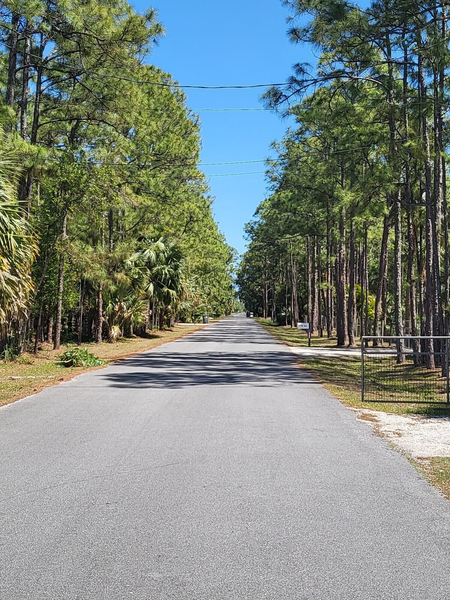 Property Photo:  9608 Mockingbird Trail  FL 33478 