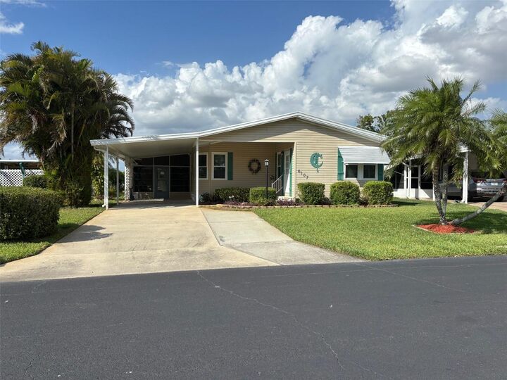 Property Photo:  6107 Grand Oaks Drive SE  FL 33884 