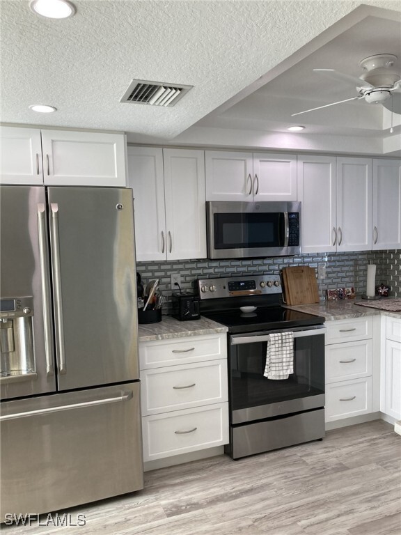 Property Photo: 26705 Little John Court 54 FL 34135