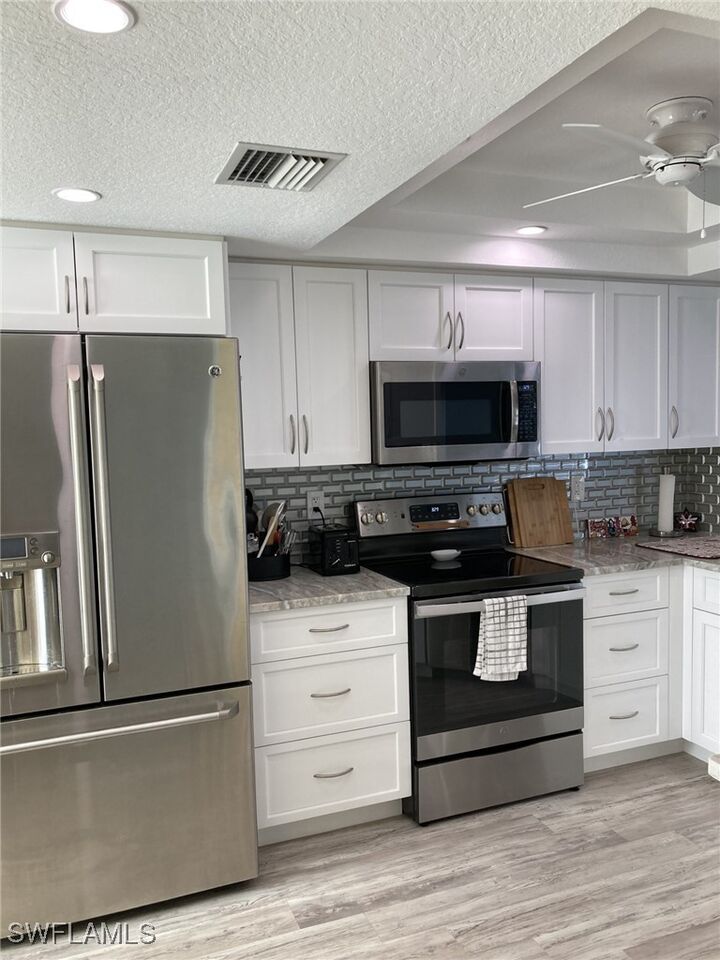 Property Photo:  26705 Little John Court 54  FL 34135 