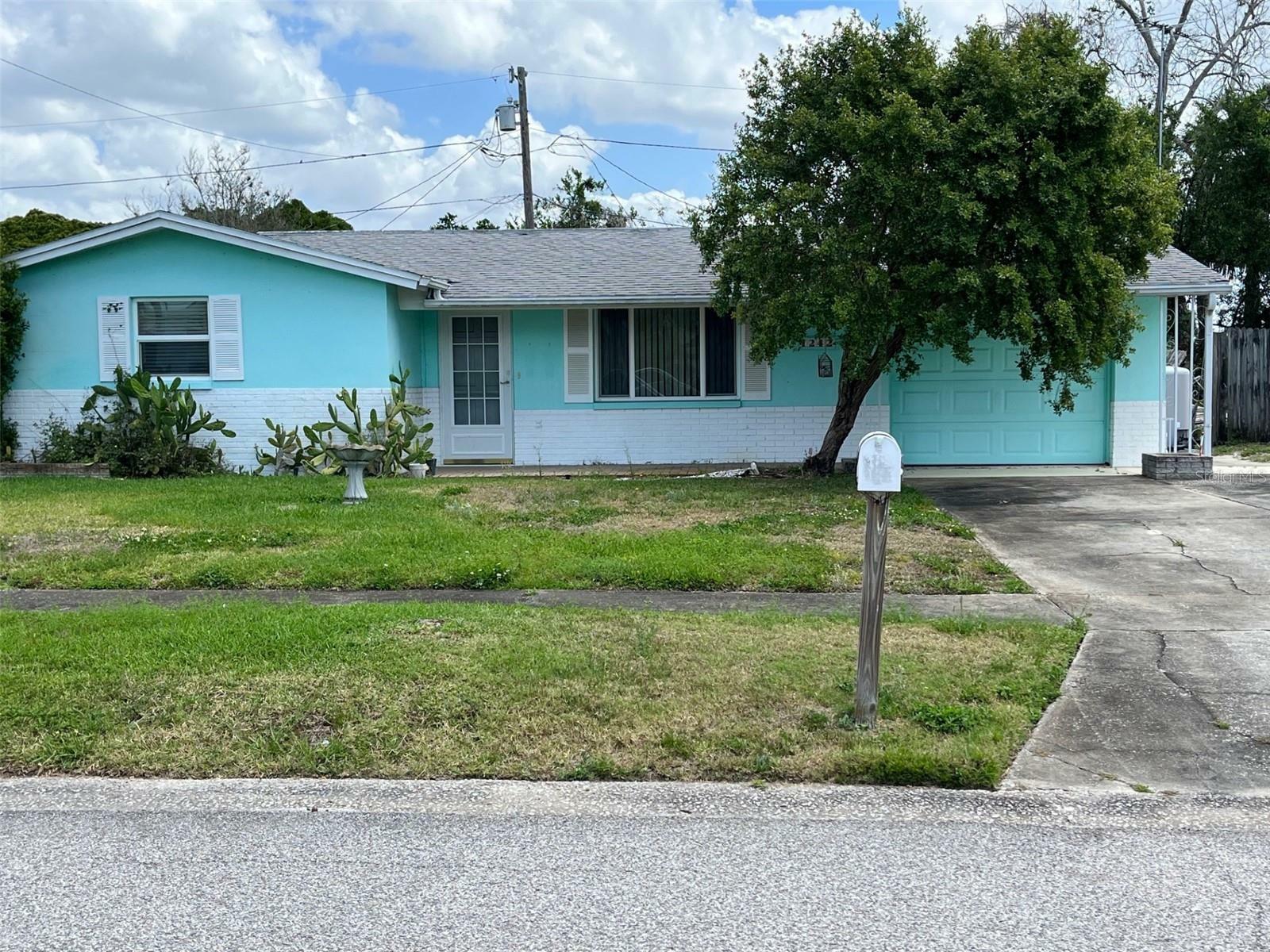 Property Photo: 1242 Ermine Drive FL 34690