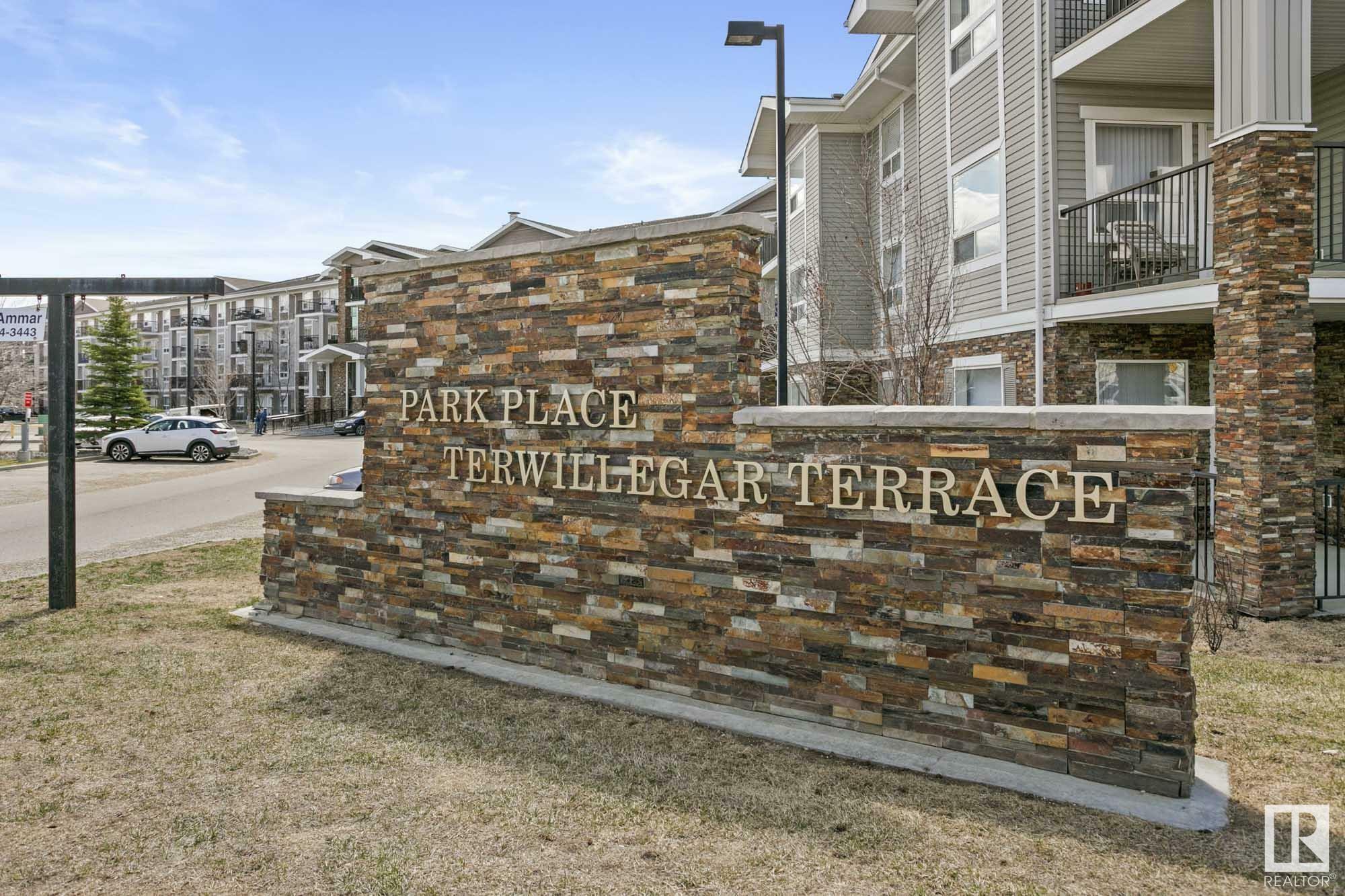 Property Photo: 9363 Simpson Drive NW 1123 AB T6R 0N2