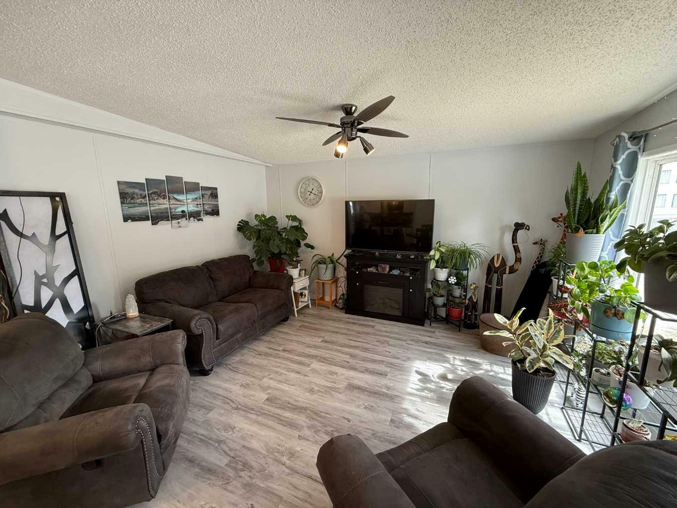Property Photo: 700 Carmichael Lane 413 AB T7V 1S9