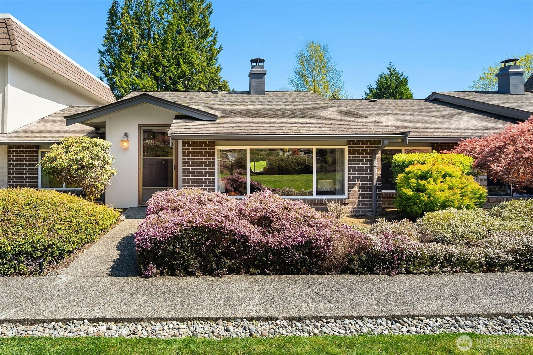 Property Photo:  17050  Northup Way 34  WA 98008 