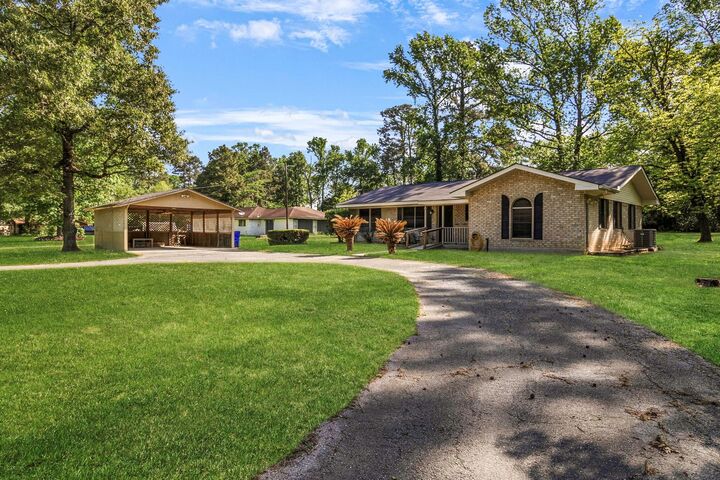 Property Photo:  209 H Armitage Road  TX 77351 