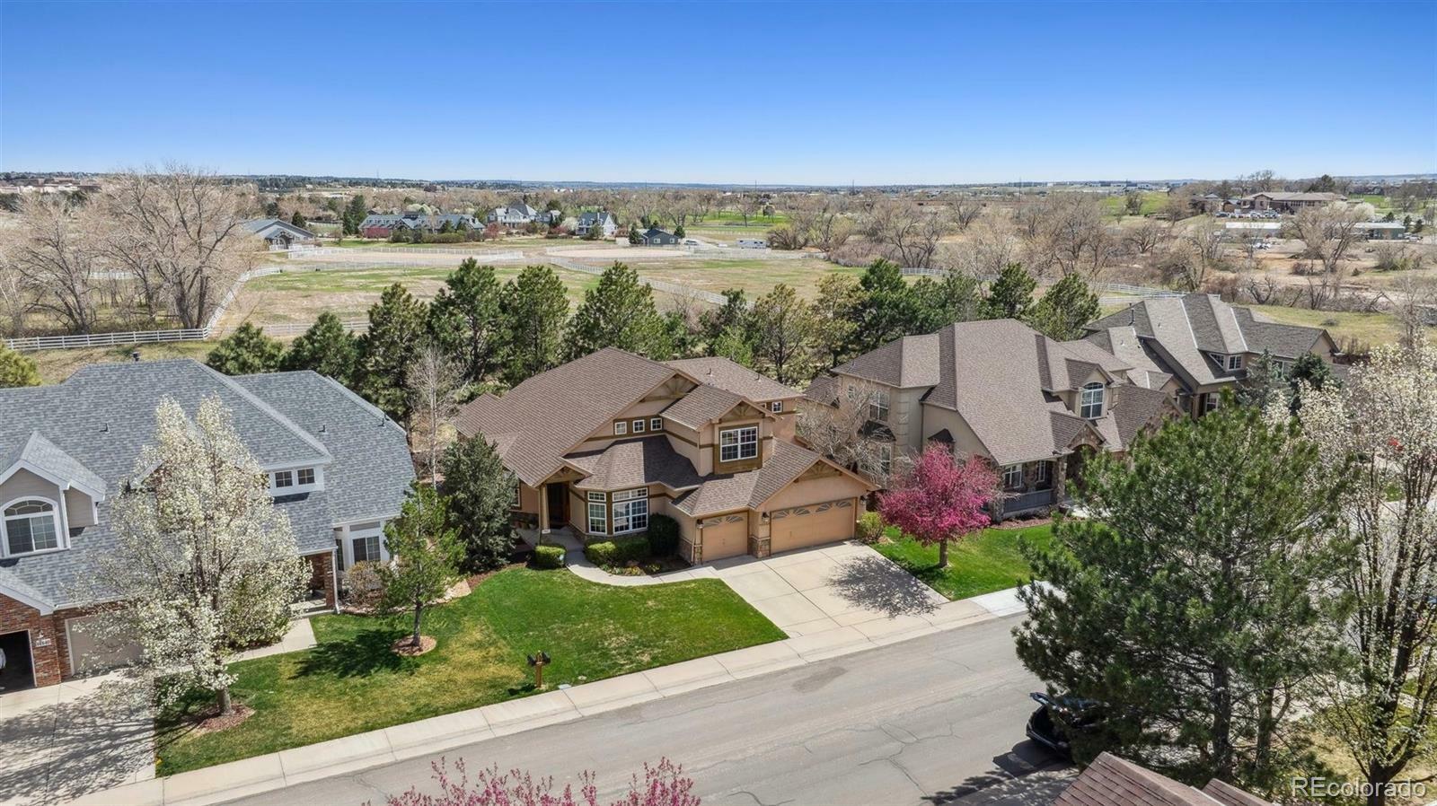 Property Photo: 14820 E Maplewood Drive CO 80016