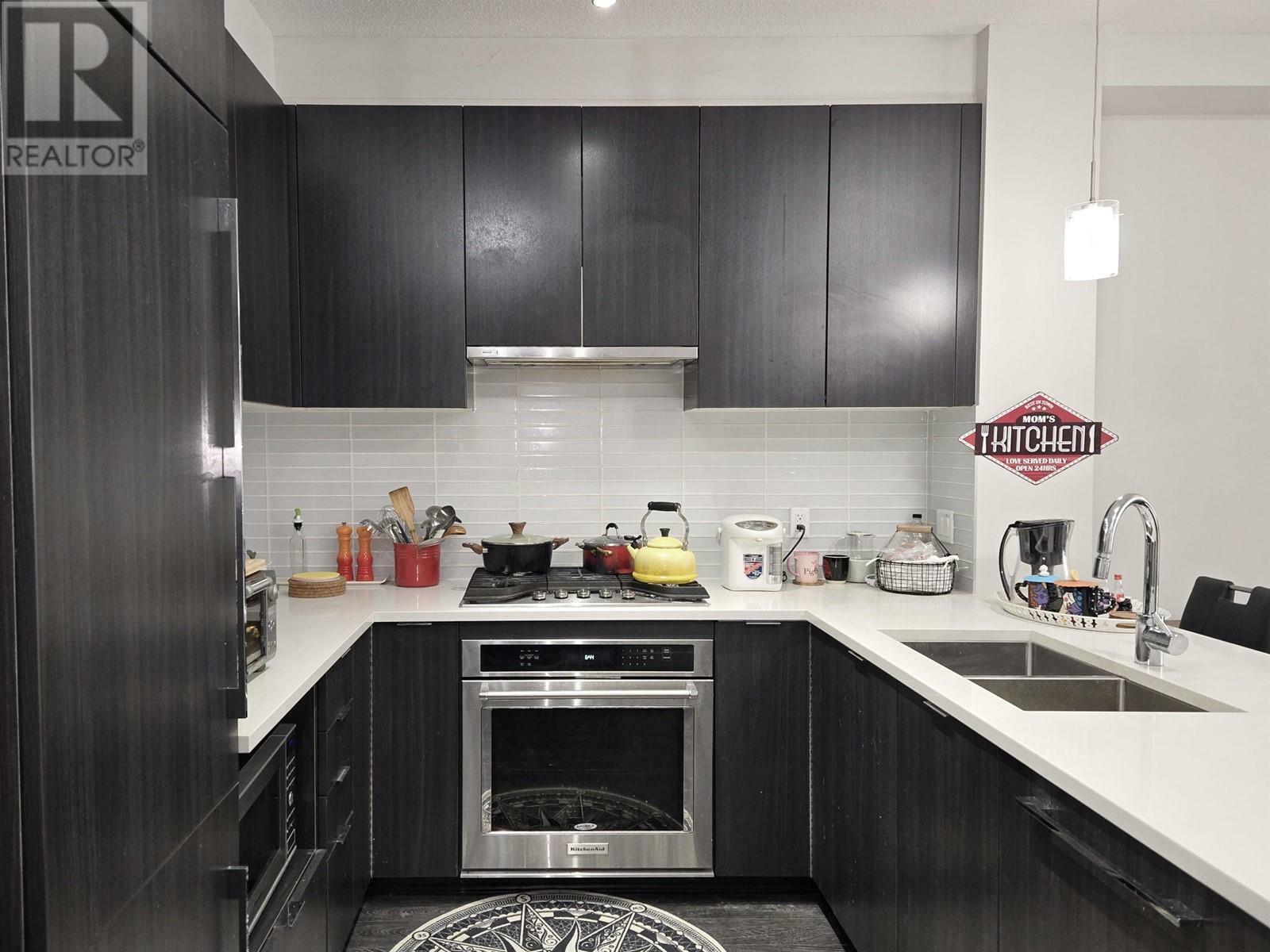 Property Photo: 9366 Tomicki Avenue 107 BC V6X 0N9