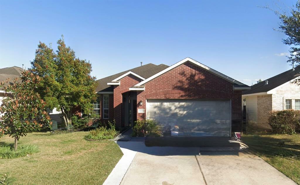Property Photo: 7534 Oakwood Canyon Drive TX 77433