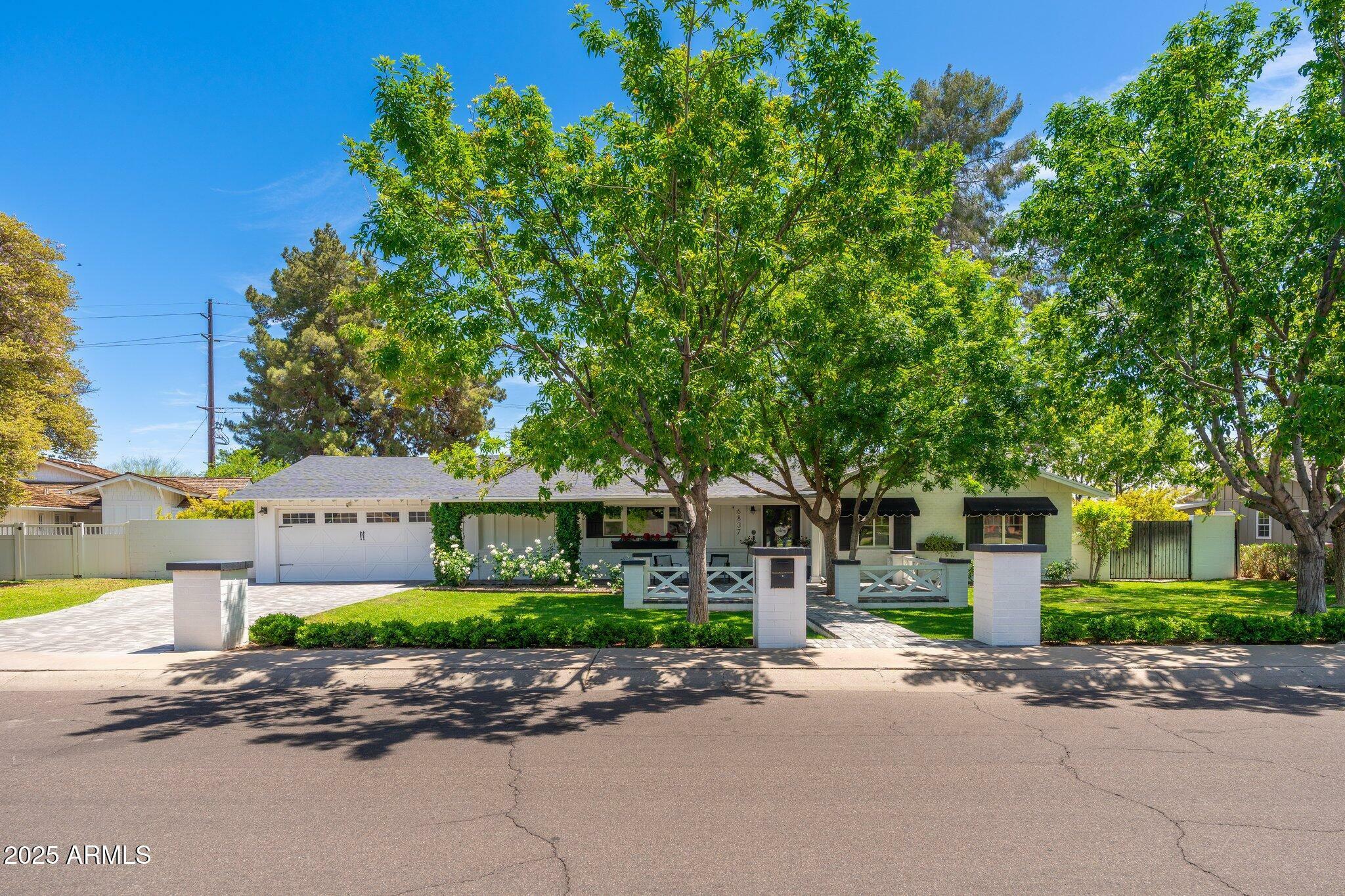 Property Photo: 6837 E Lafayette Boulevard AZ 85251