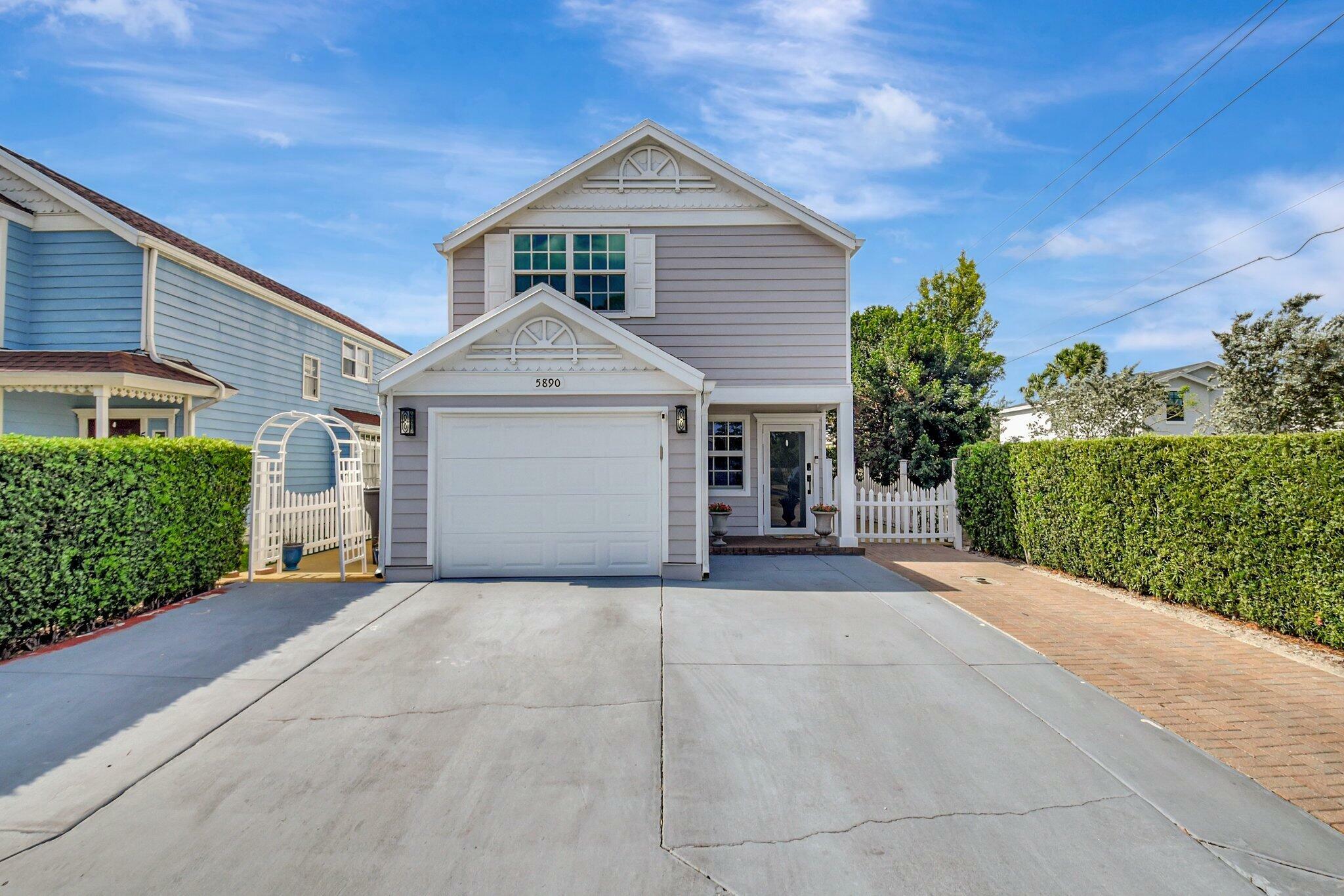 Property Photo: 5890 Rambler Rose Way FL 33415