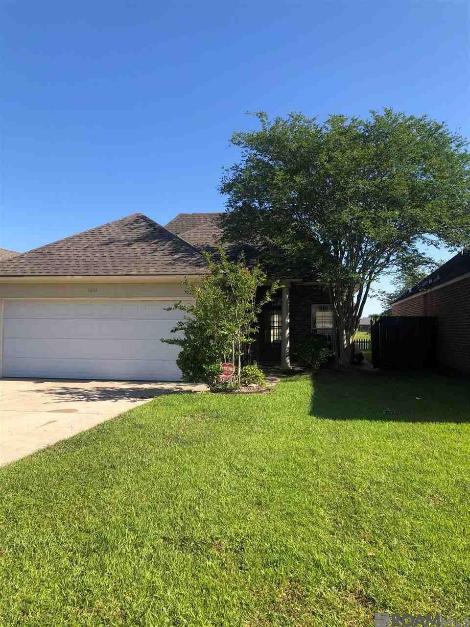 Property Photo:  3858 Southpass Ave  LA 70820 