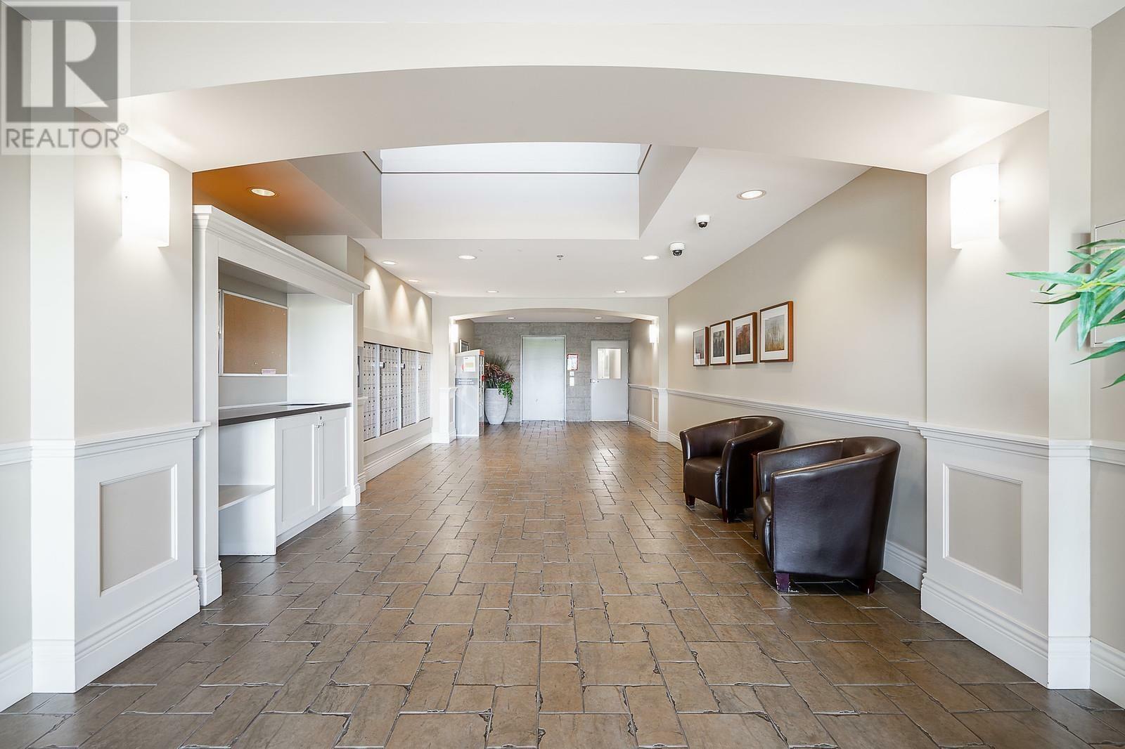 Property Photo: 19673 Meadow Gardens Way 123 BC V3Y 0A1