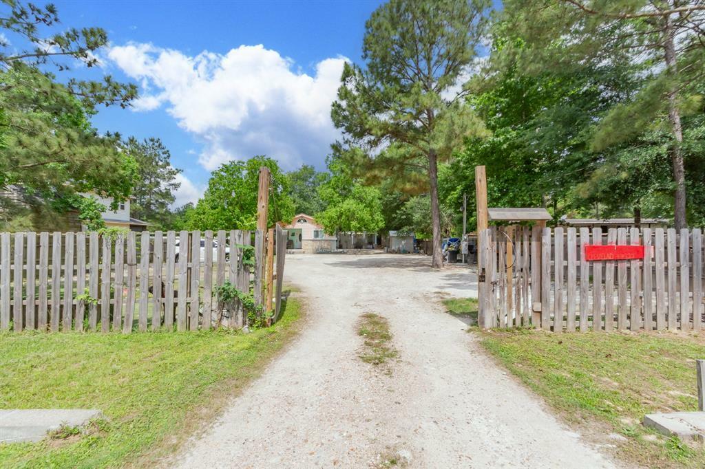 Property Photo: 109 County Road 3413 TX 77327