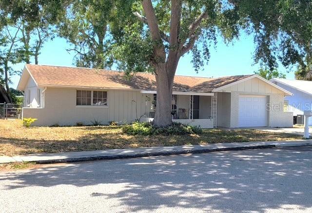 Property Photo: 9835 El Camino Real Avenue FL 34668