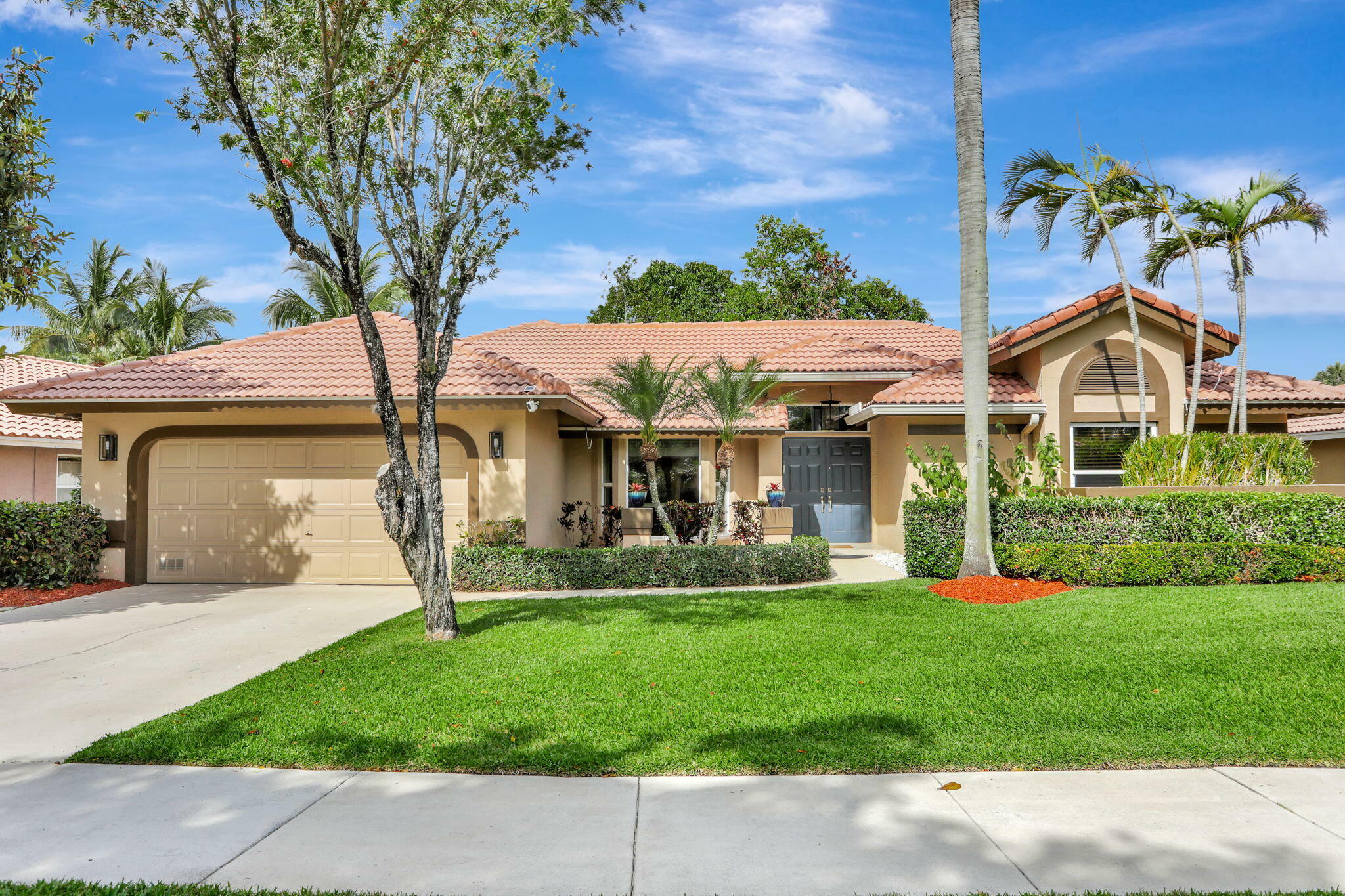 Property Photo: 385 NW 37th Way FL 33442