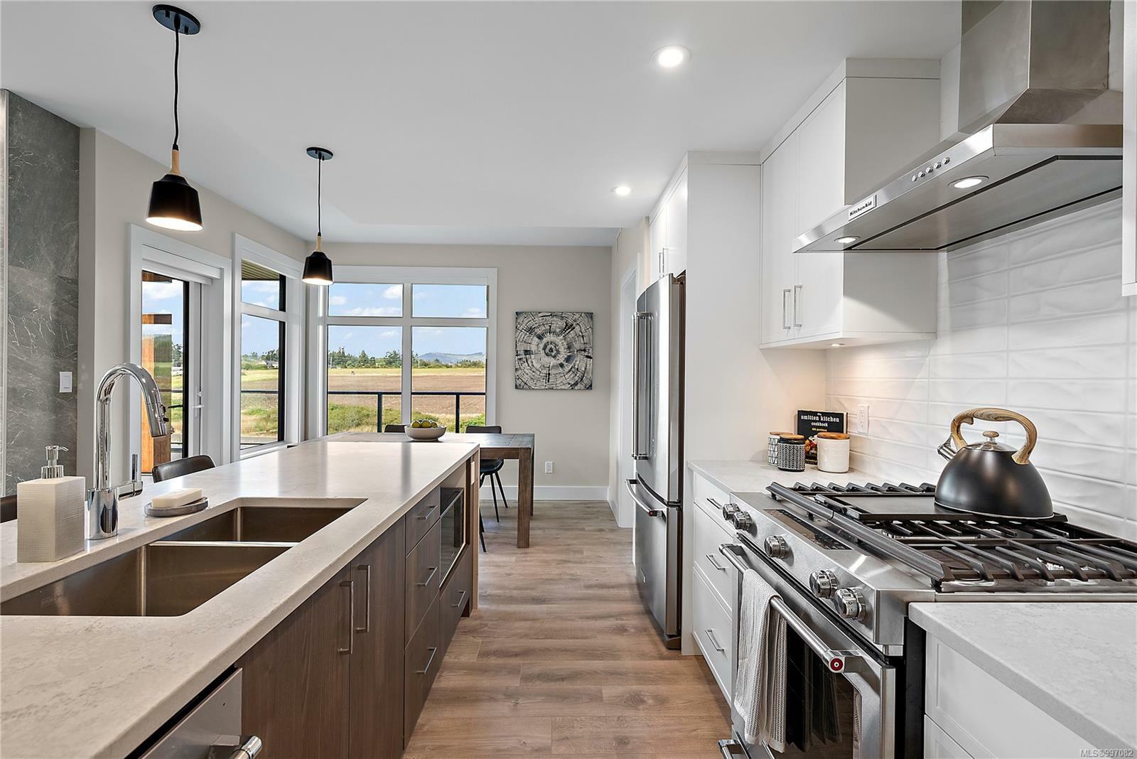 Property Photo: 2520 Hackett Cres 309 BC V8M 0B9