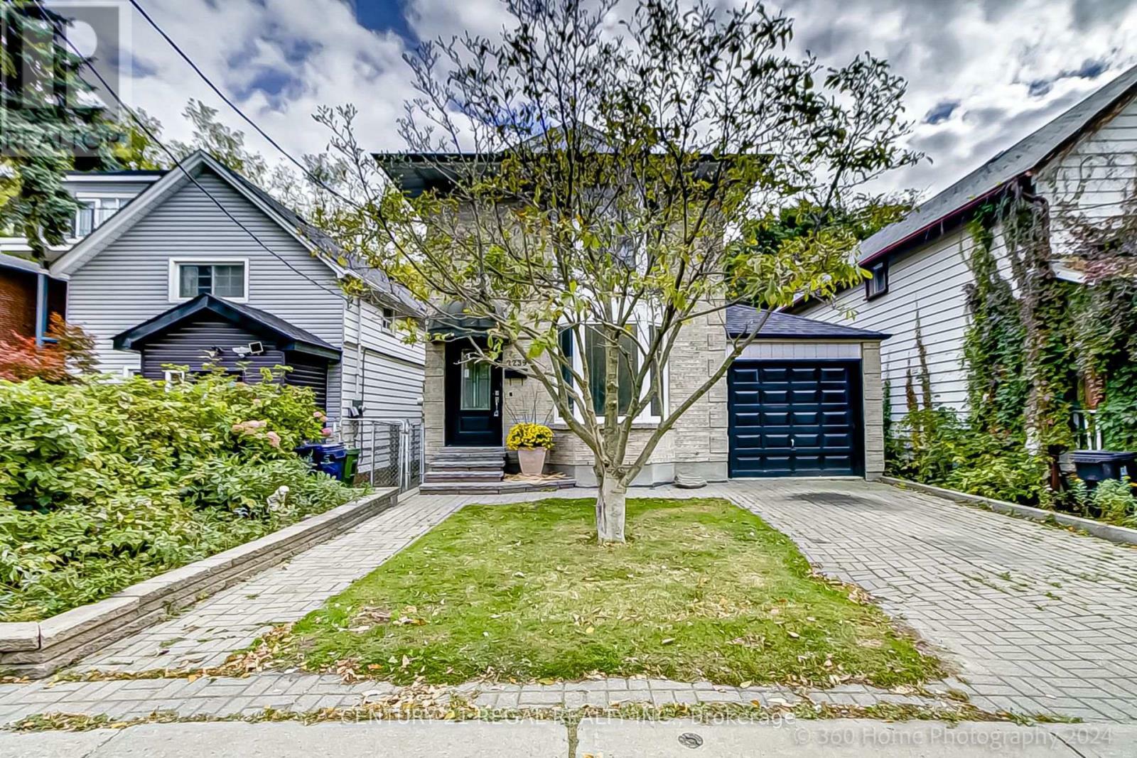 Photo de la propriété: 2239 Gerrard Street East ON M4E 2C9