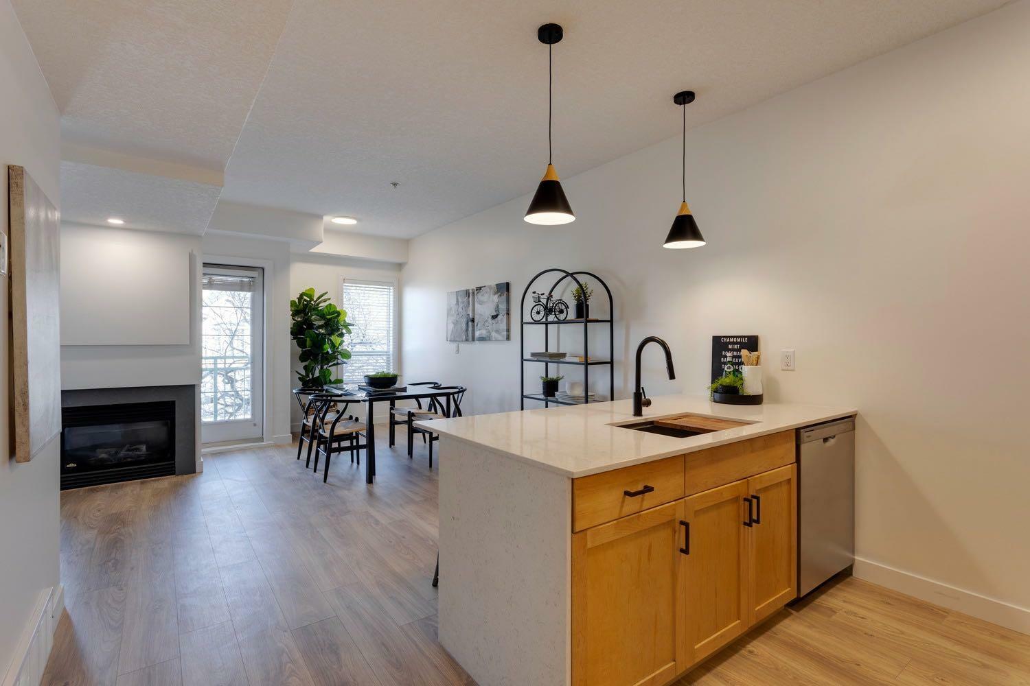 Property Photo: 1235 13 Avenue SW 311 AB T3C 0T2