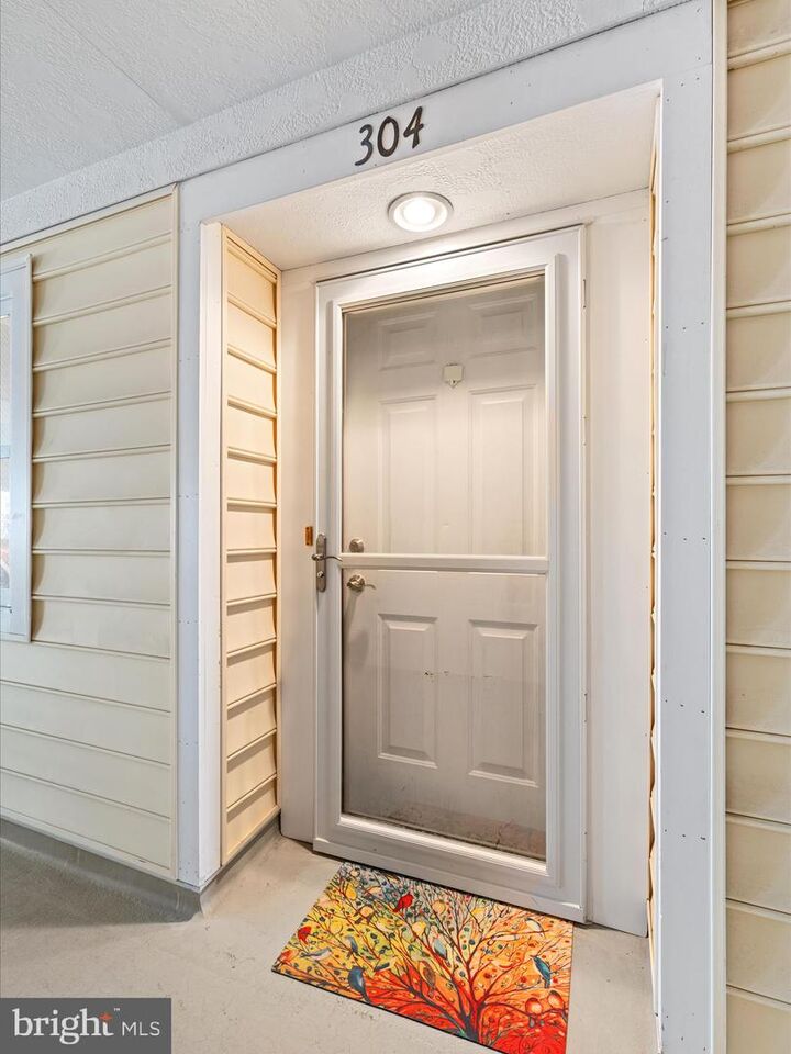 Property Photo:  30413 Cedar Neck Road 304  DE 19970 