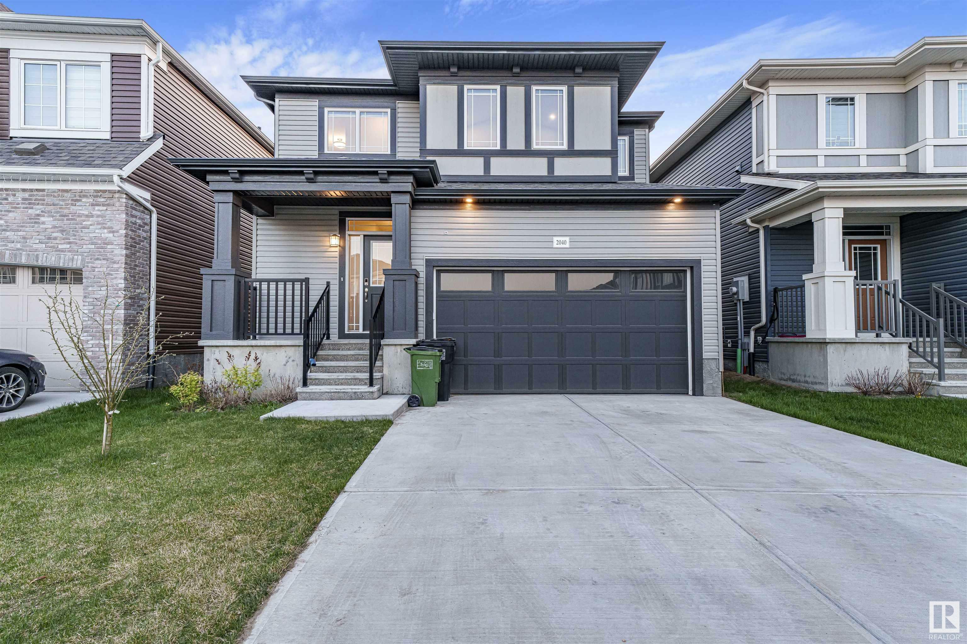 Property Photo: 2040 207 Street NW AB T6M 1R7