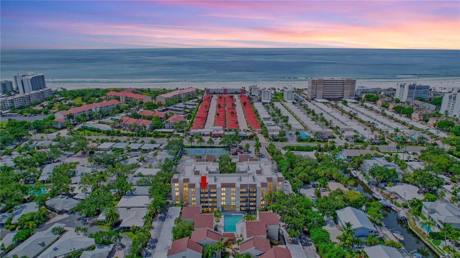 Property Photo:  6157 Midnight Pass Road E65  FL 34242 