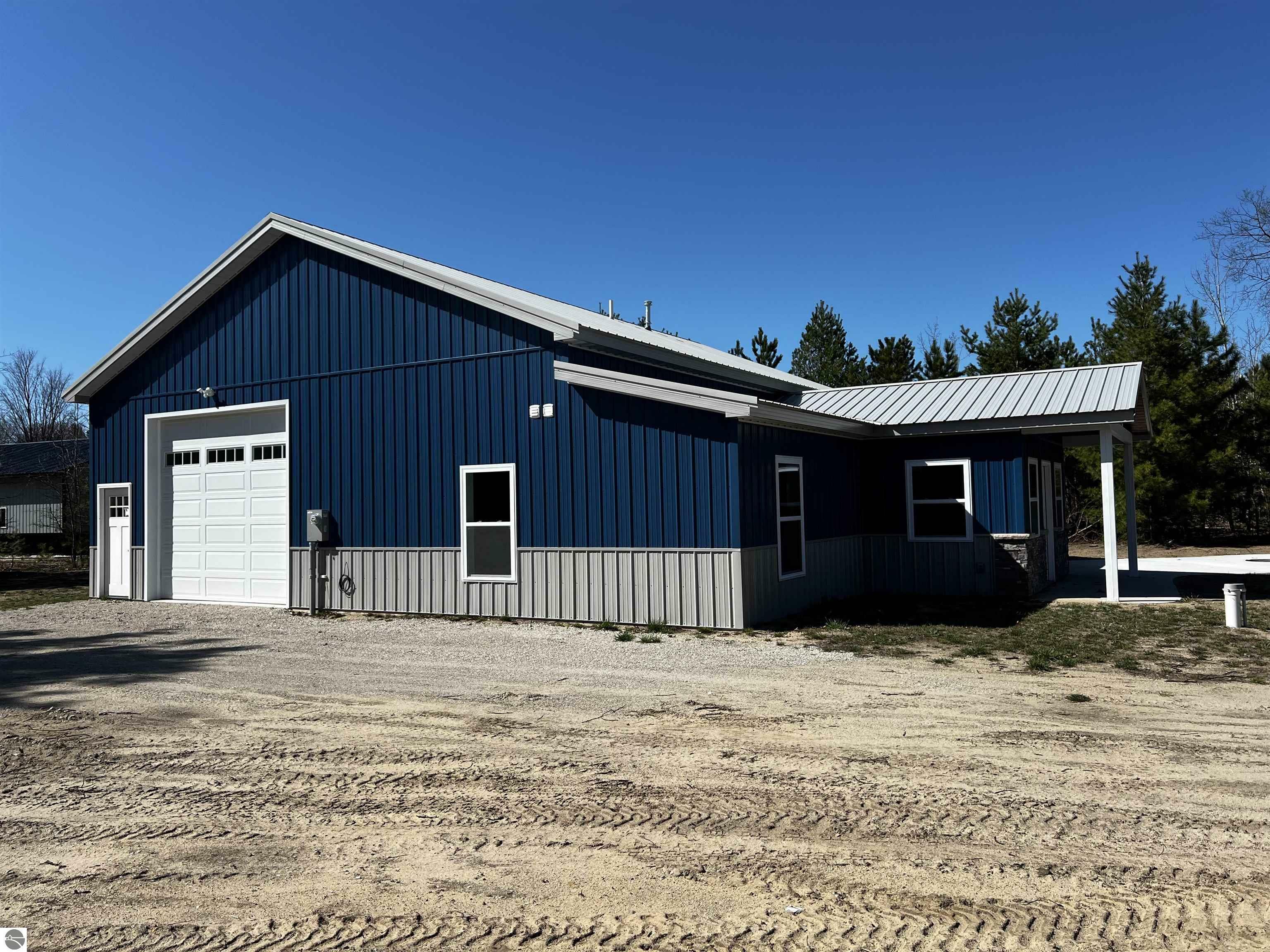 Property Photo: 7918 Springwater Drive Villa De Clearwater MI 49676