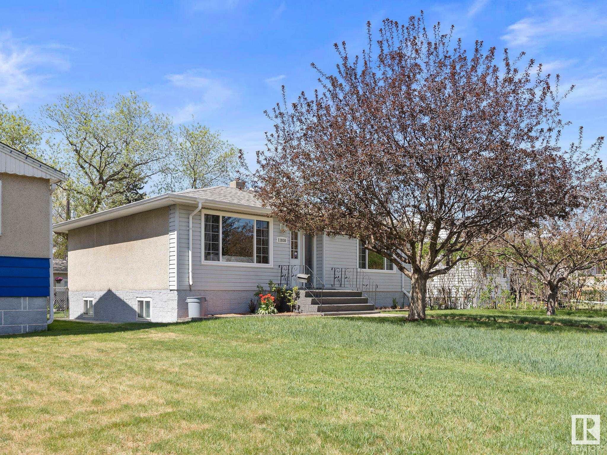 Property Photo: 11930 50 Street NW AB T5W 3C2