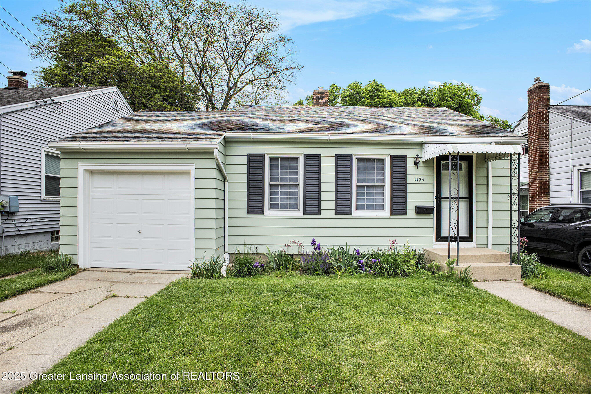 Property Photo: 1124 Poxson Avenue MI 48910