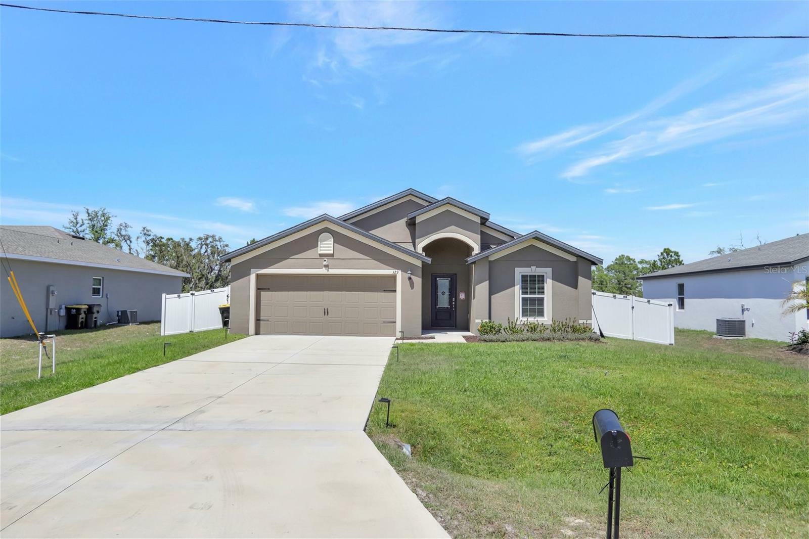 Property Photo: 329 W Aster Court FL 34759