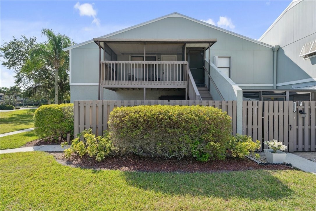 Property Photo: 1133 Breezy Way 8H FL 32958