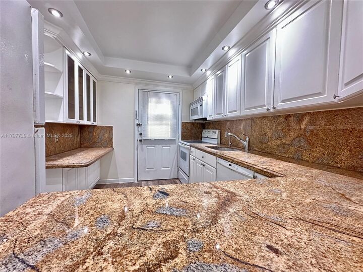 Property Photo:  201 Galen Dr 211W  FL 33149 