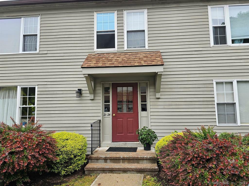 Property Photo: 24 Village Walk 24 CT 06897