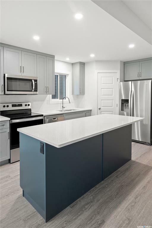 Property Photo: 210 Antonini Court SK S7L 7P3